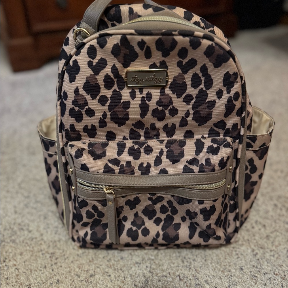 Itzy Ritzy Mini Diaper Backpack and Boss Pouch  Wristlet (Leopard)